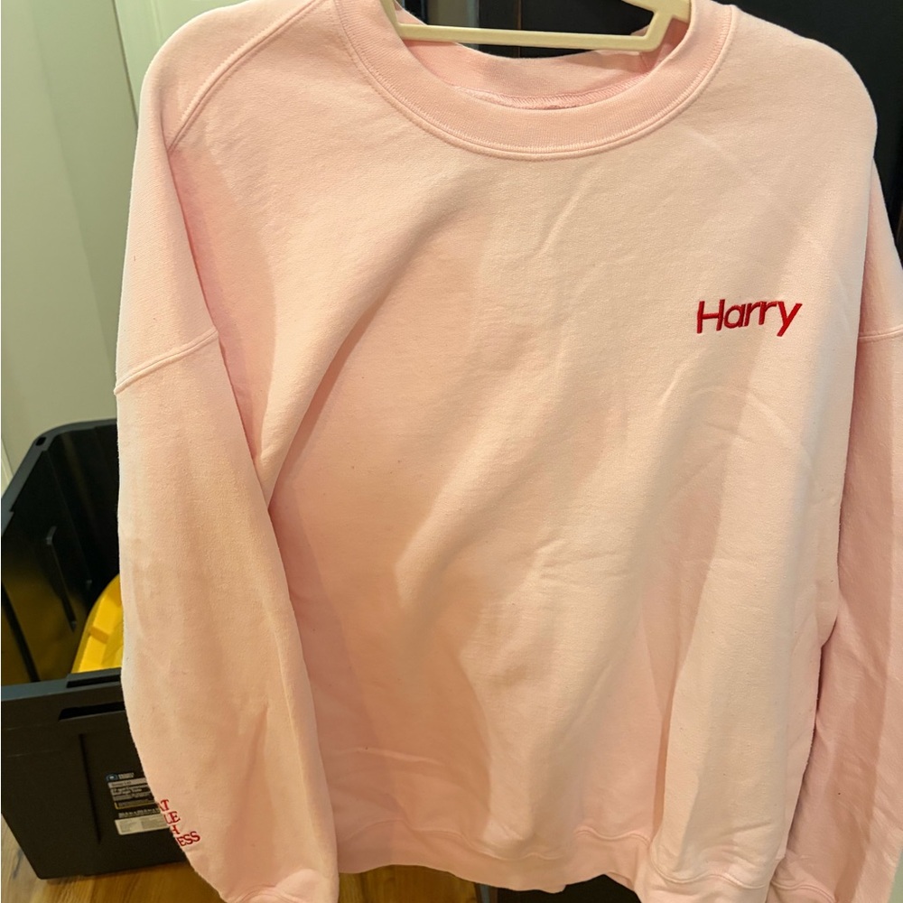 Pink Sweatshirt with Red Text
